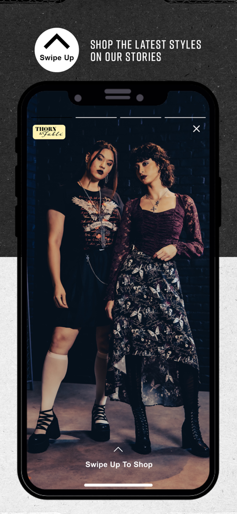 Hot Topic: Pop Culture Fashion - Hot Topic mobile app displaying alternative fashion stories with models and a swipe up to shop feature