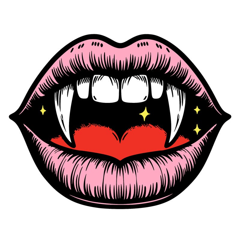 lips with vampire teeth