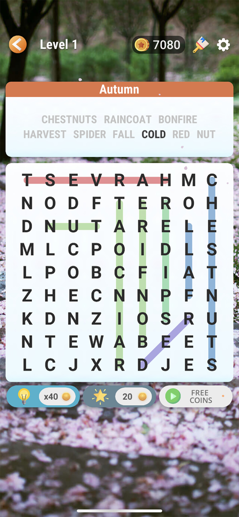Word Search - Find Hidden Word - Un colorido nivel de puzle de sopa de letras con temática de otoño con palabras ocultas resaltadas en una cuadrícula de letras.
