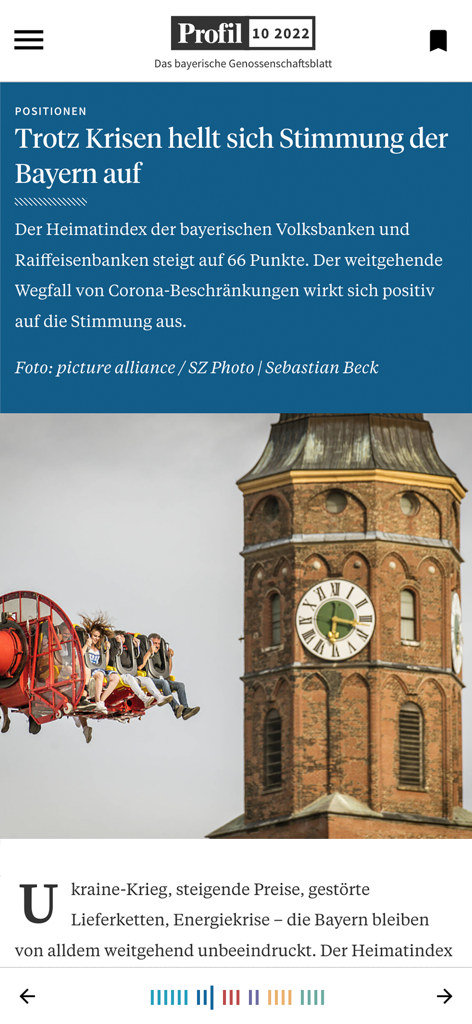 Ein digitaler Magazinartikel in der Profil App, der Nachrichten über die bayerische Wirtschaftsstimmung mit einem Glockenturmbild anzeigt