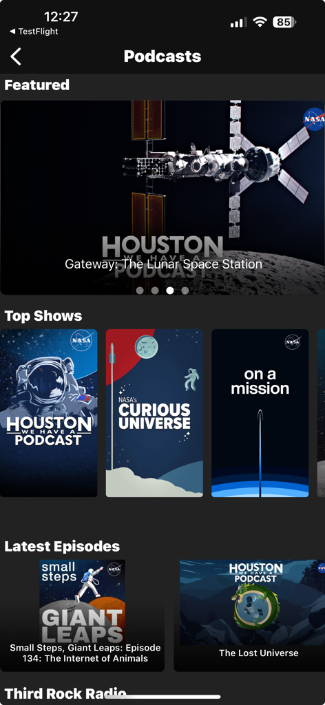 NASA - Screenshot of the NASA app Podcasts section featuring popular shows like Houston We Have a Podcast and NASA's Curious Universe.