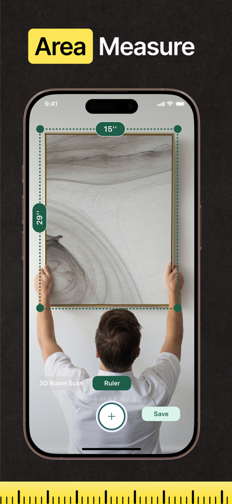 Metrixアプリが壁の額縁の寸法を測定するために拡張現実を使用している様子