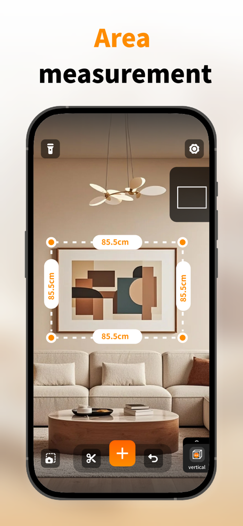 AR Ruler app measuring the dimensions of a picture frame on a living room wall