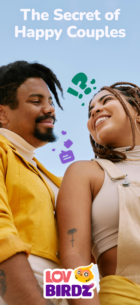 Happy young couple smiling at each other for the LovBirdz couple love quiz app.