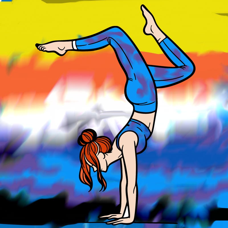 a woman doing a handstand