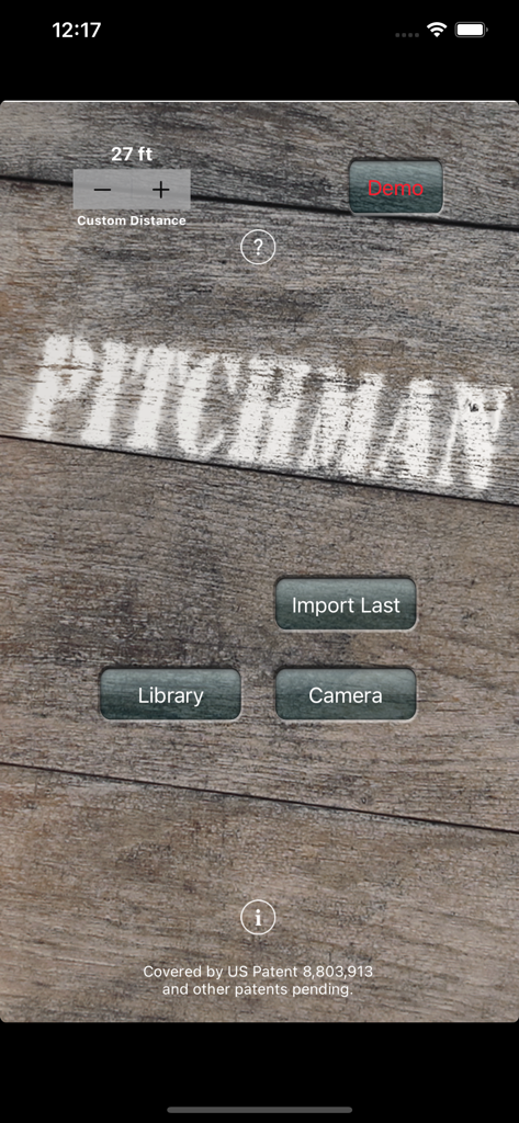 Pitchman Radar Gun - Main menu of the Pitchman Radar Gun app featuring camera and library buttons on a wooden background