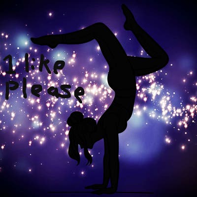 a woman doing a handstand