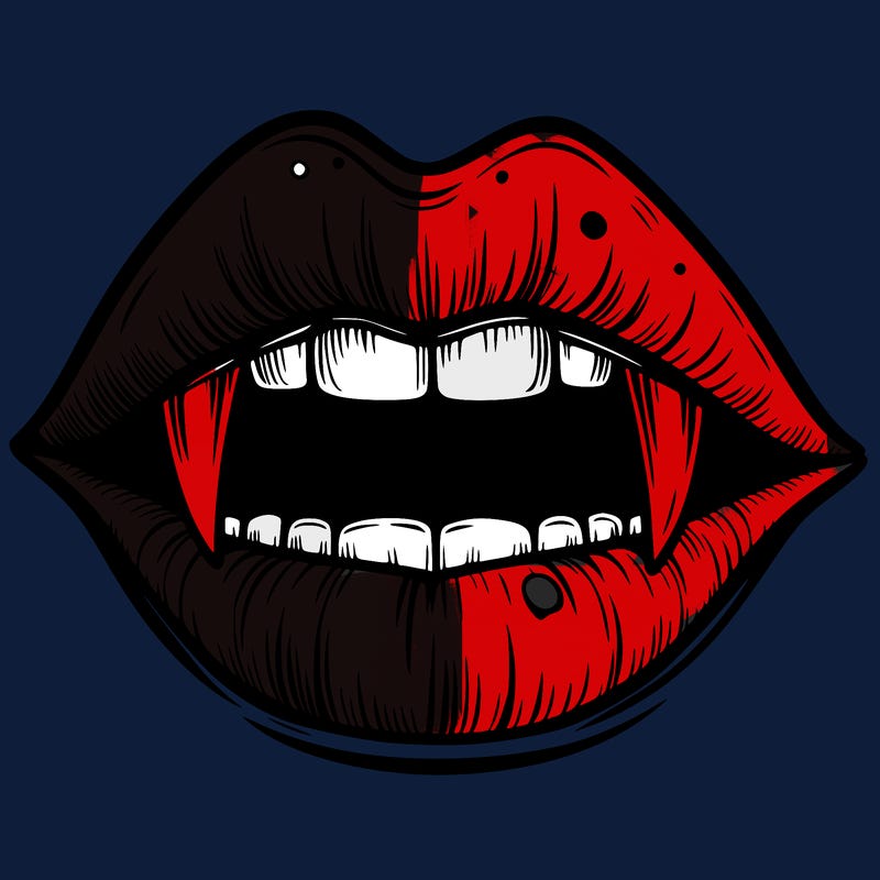 lips with vampire teeth