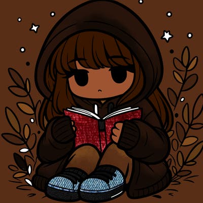 girl in oversized hoodie reading a book