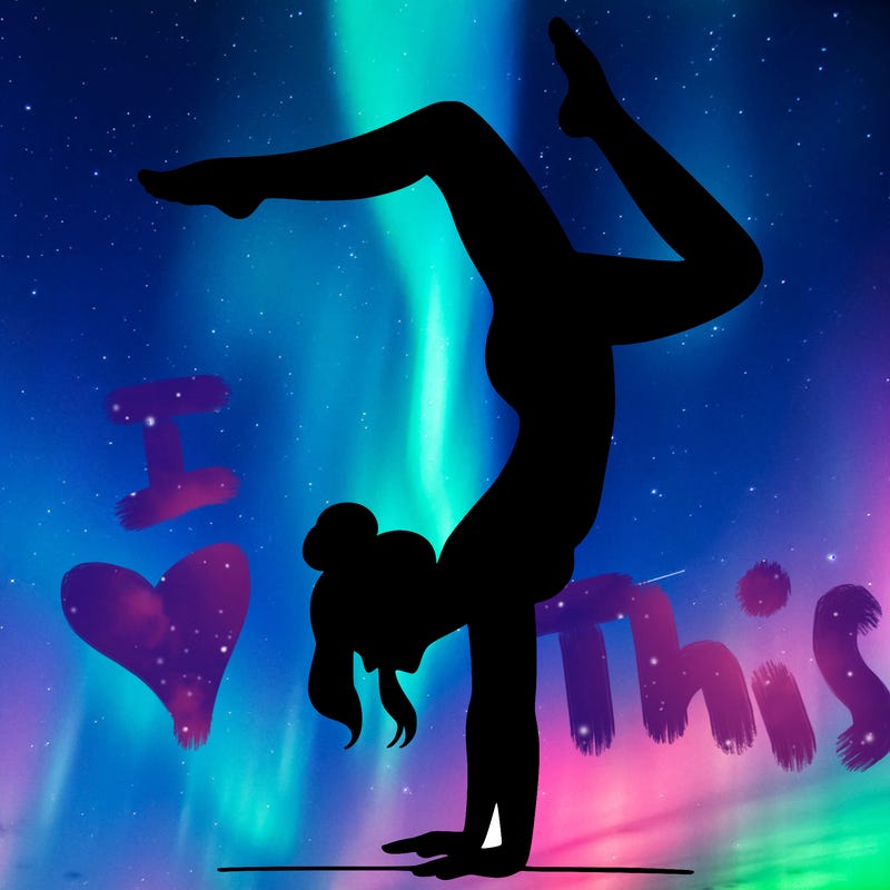 a woman doing a handstand