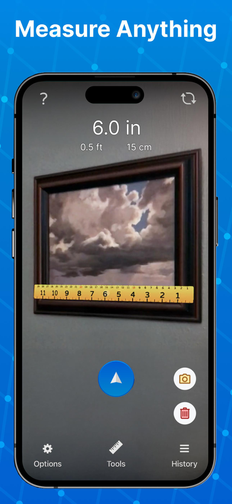 AR tape measure app measuring a framed painting on a wall