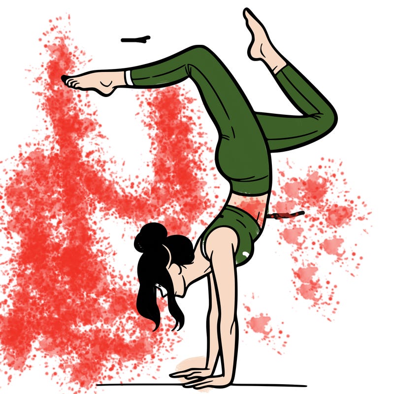 a woman doing a handstand