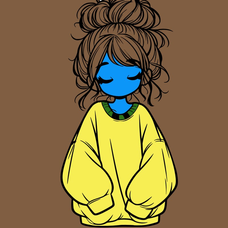 girl with baggy sweatshirt and messy bun