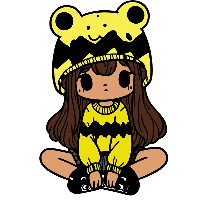 a girl wearing a frog hat and some frog socks