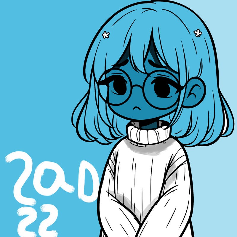 sad girl with glasses in a sweater