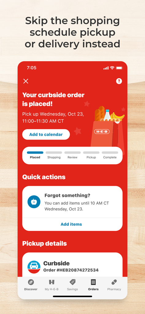My H-E-B app interface showing a curbside order confirmation and order tracking status