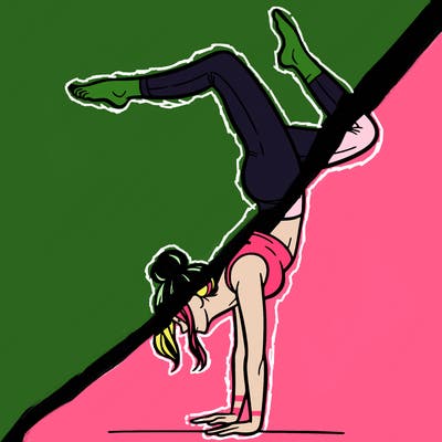 a woman doing a handstand