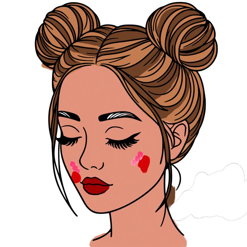 woman with hair buns