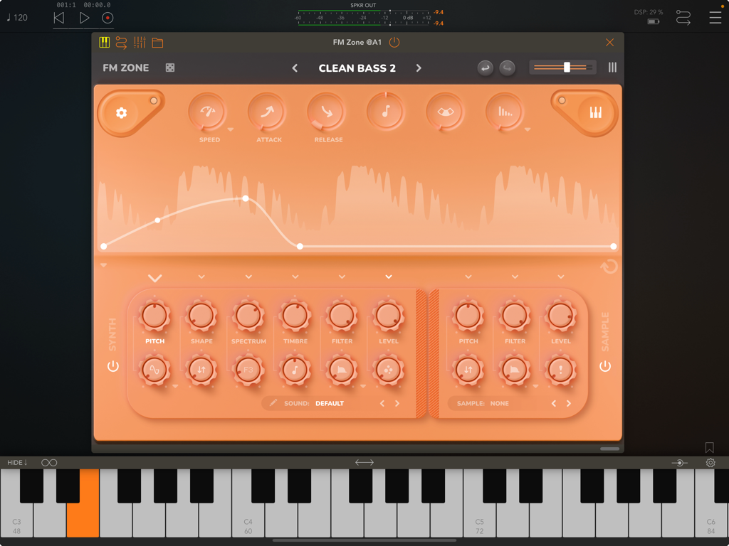 Interface of the FM Zone synthesizer app on iPad with orange controls and a piano keyboard.