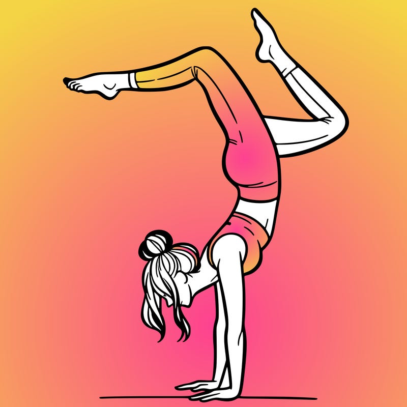a woman doing a handstand