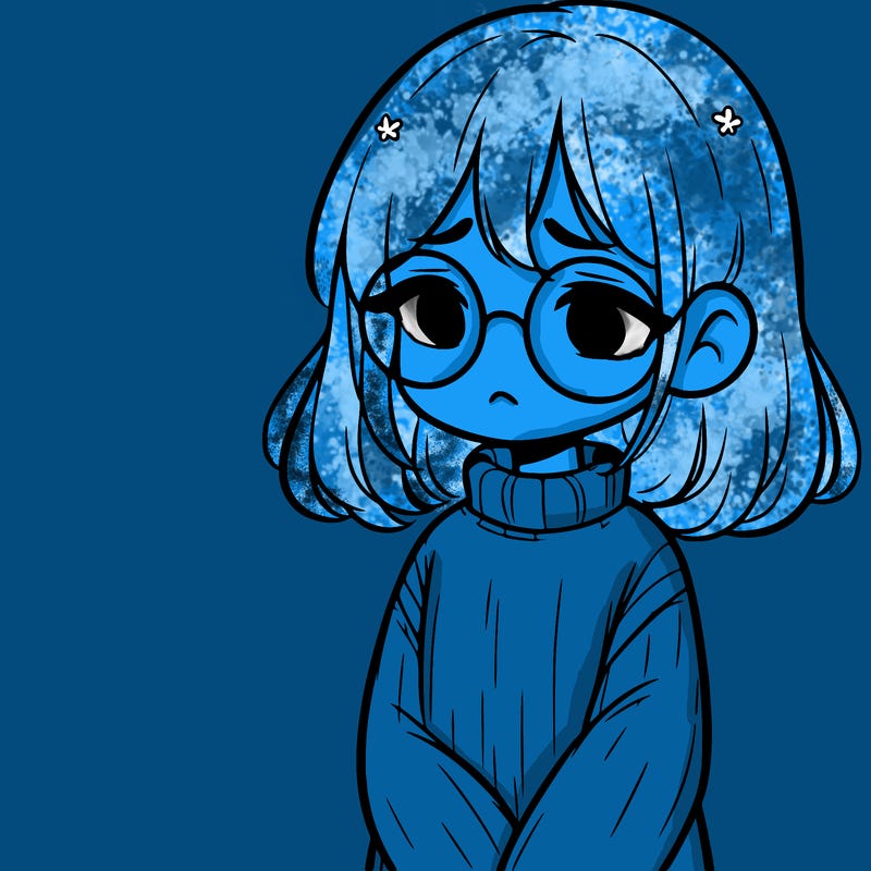 sad girl with glasses in a sweater