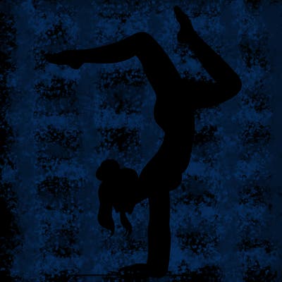 a woman doing a handstand