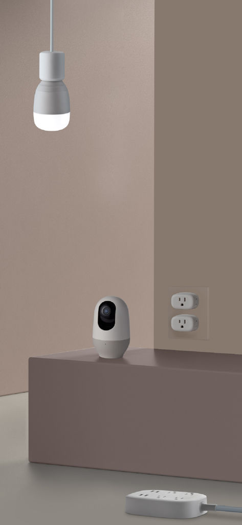 Nooie - Eine minimalistische Einrichtung mit Nooie Smart-Home-Produkten, einschließlich einer Sicherheitskamera, einer Glühbirne und Smart-Steckdosen