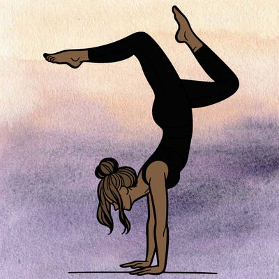 a woman doing a handstand