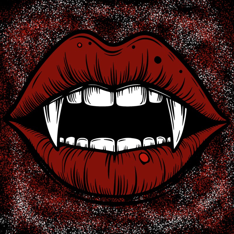 lips with vampire teeth