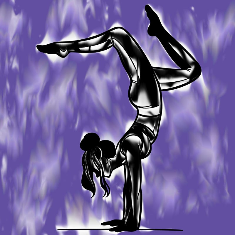 a woman doing a handstand