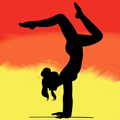 a woman doing a handstand