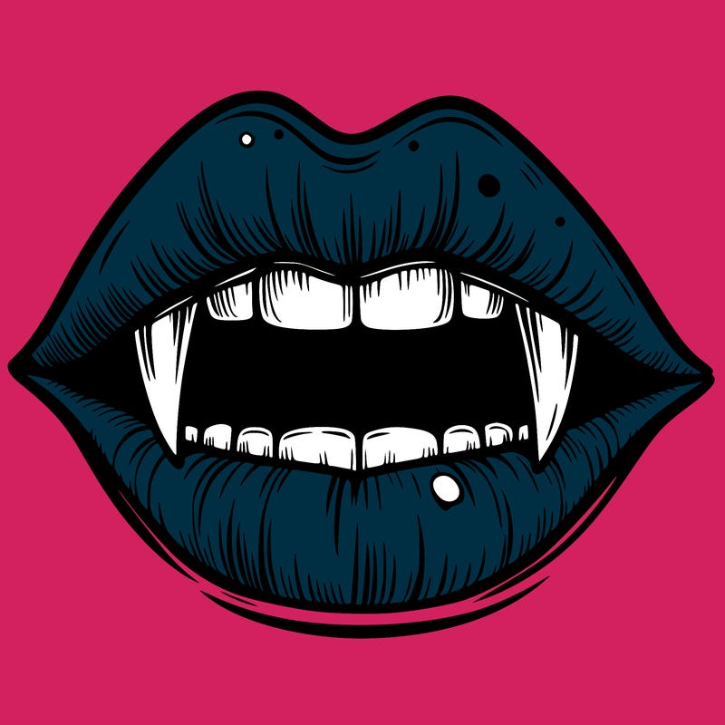 lips with vampire teeth