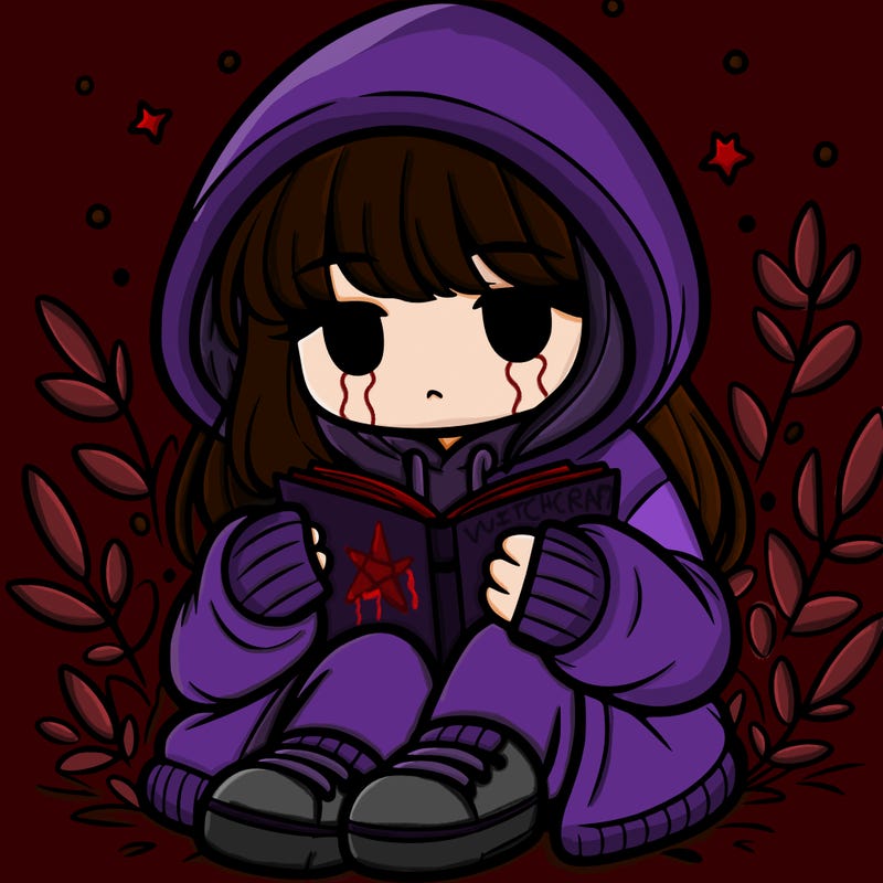 girl in oversized hoodie reading a book