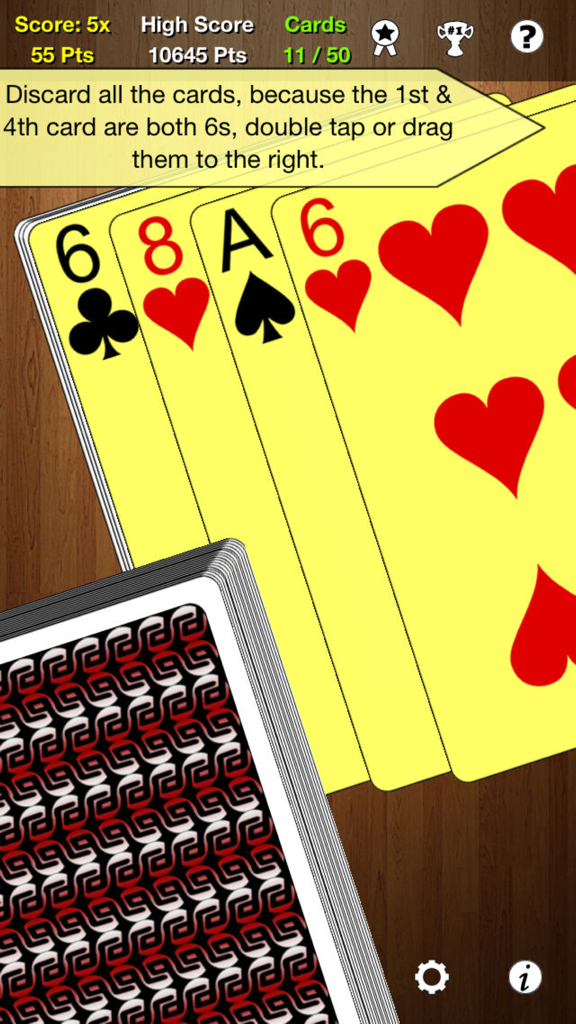 One Handed Solitaire - Gameplay screen of One Handed Solitaire showing a matching pair of sixes with instructions on how to discard cards.