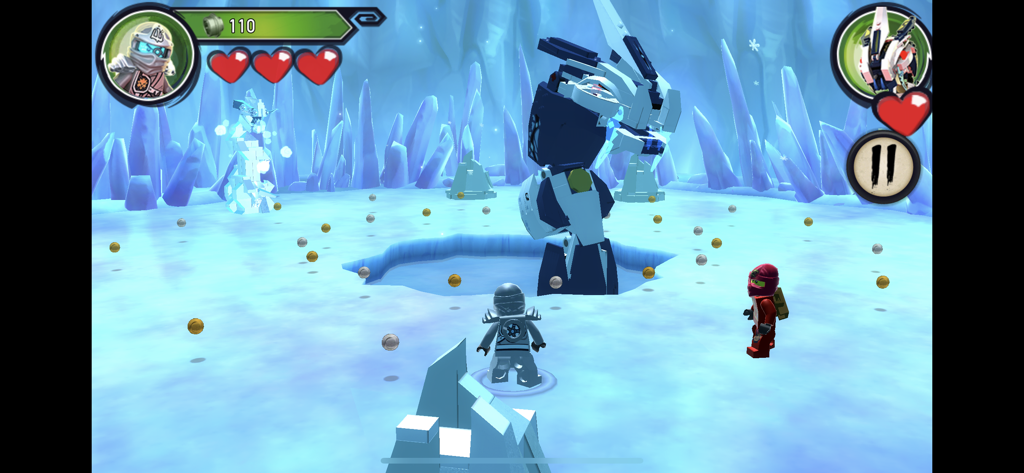 Gameplay of LEGO Ninjago Shadow of Ronin showing ninjas and a mech in the Ice Temple