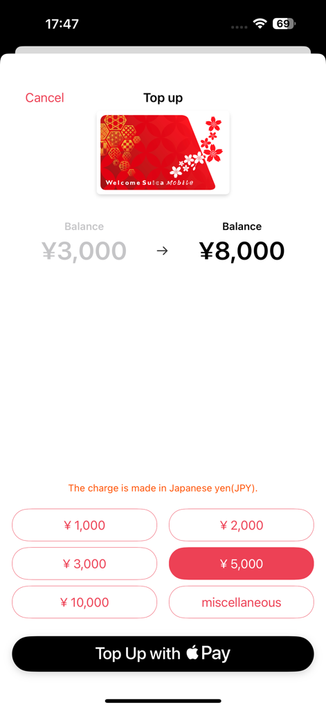 Welcome Suica Mobile - The top up screen of the Welcome Suica Mobile app showing balance recharge options and an Apple Pay payment button