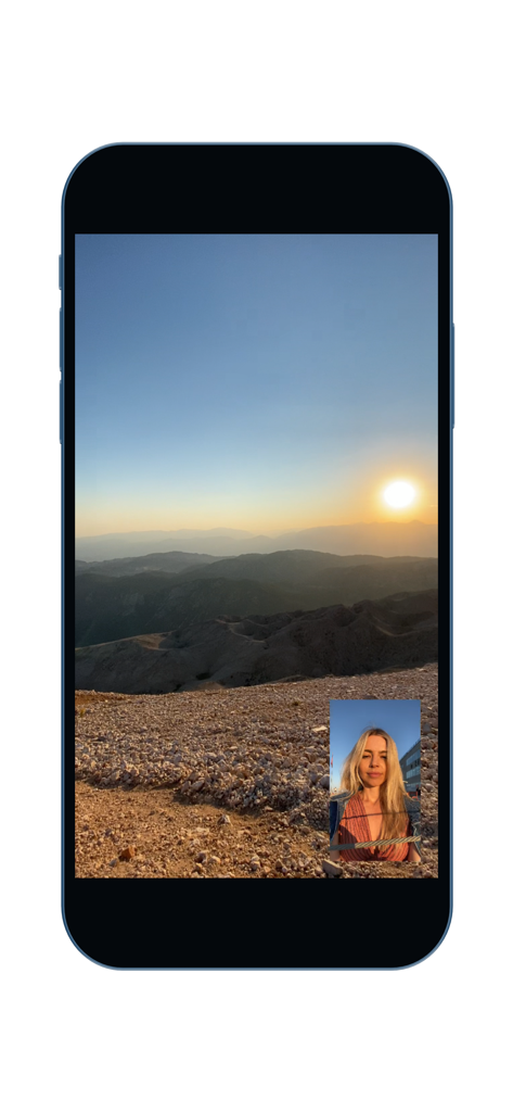 Camera FrontBack - Smartphone screen using Camera FrontBack app to capture a mountain sunset with a picture-in-picture selfie reaction