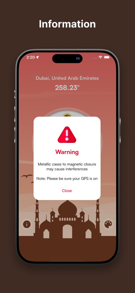 A warning message on the Qibla Compass app explaining how magnetic cases can cause interference and reminding users to turn on GPS