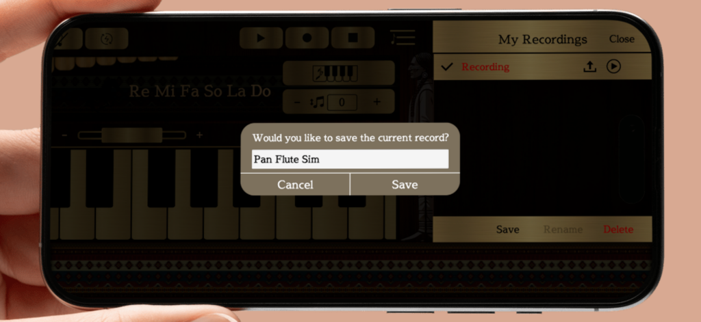 Interfaz de la aplicación Pan Flute Sim mostrando un mensaje para guardar una grabación de música en un smartphone