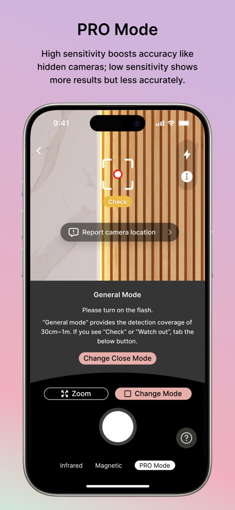 DETEKCAM: AI Camera Detector - Smartphone screen showing Detekcam Pro Mode interface scanning for hidden cameras on a wooden wall.