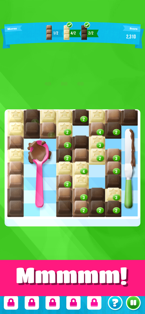 Choco Blocks Chocolate Factory - Gameplay screen of Choco Blocks showing a match-three puzzle grid with chocolate tiles and a pink spoon