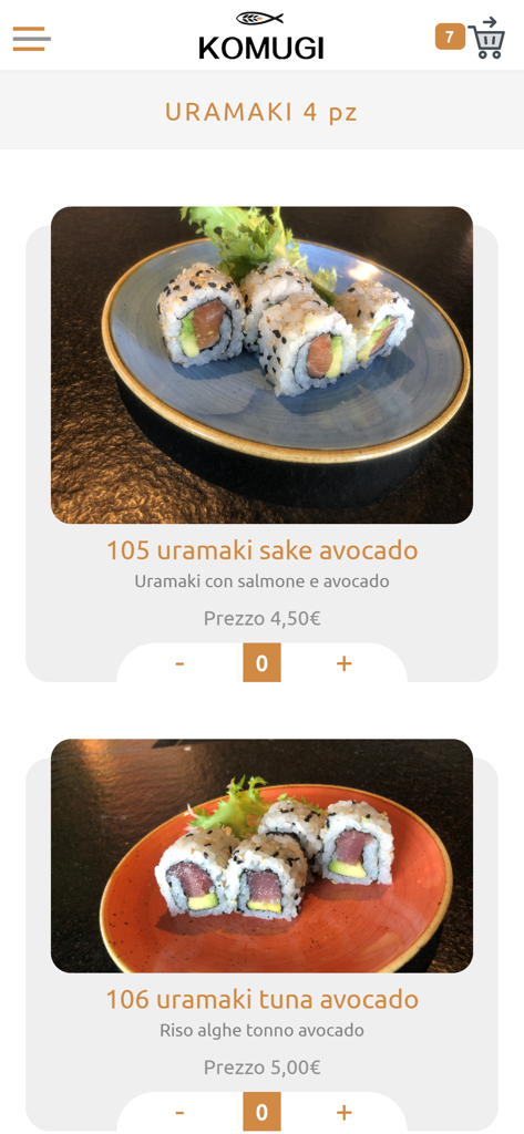 Menu dell'app Komugi Sushi che mostra uramaki salmone avocado e uramaki tonno avocado con prezzi