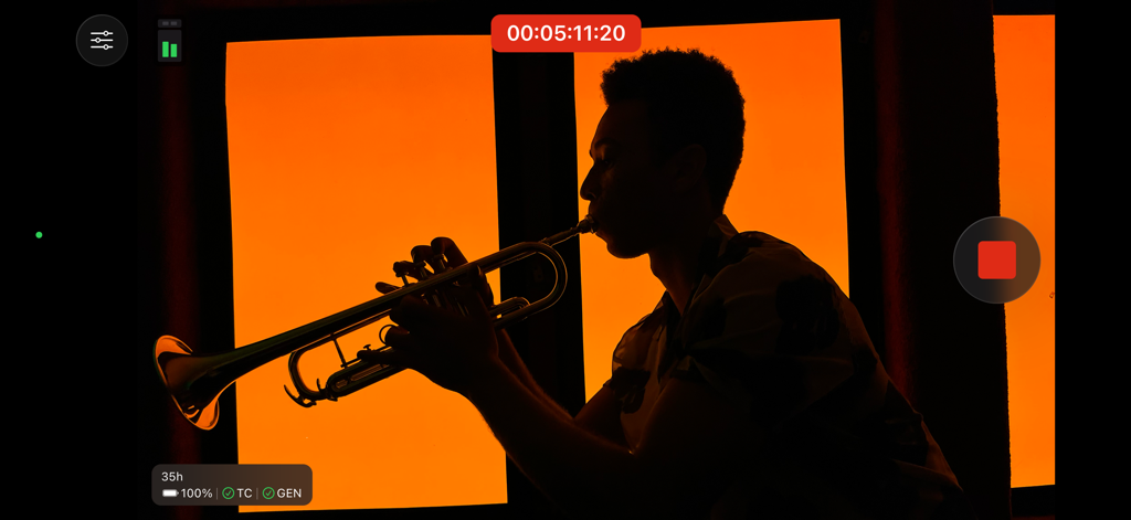 Cinematic silhouette of a trumpet player being recorded in the Final Cut Camera app interface