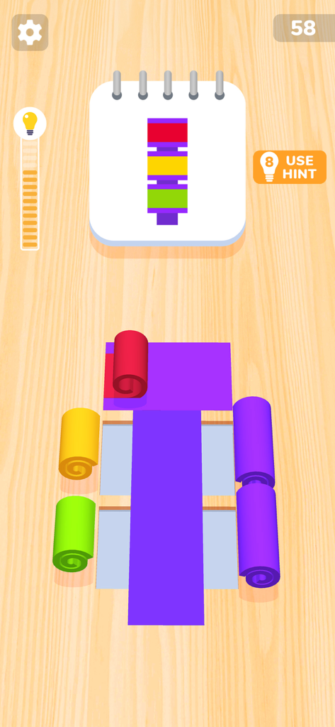 Color Roll 3D: Puzzle Art Game - Color Roll 3Dのゲームプレイ画面、ターゲット画像のパターンに合わせるためにさまざまな色のロールをレイヤー化している様子