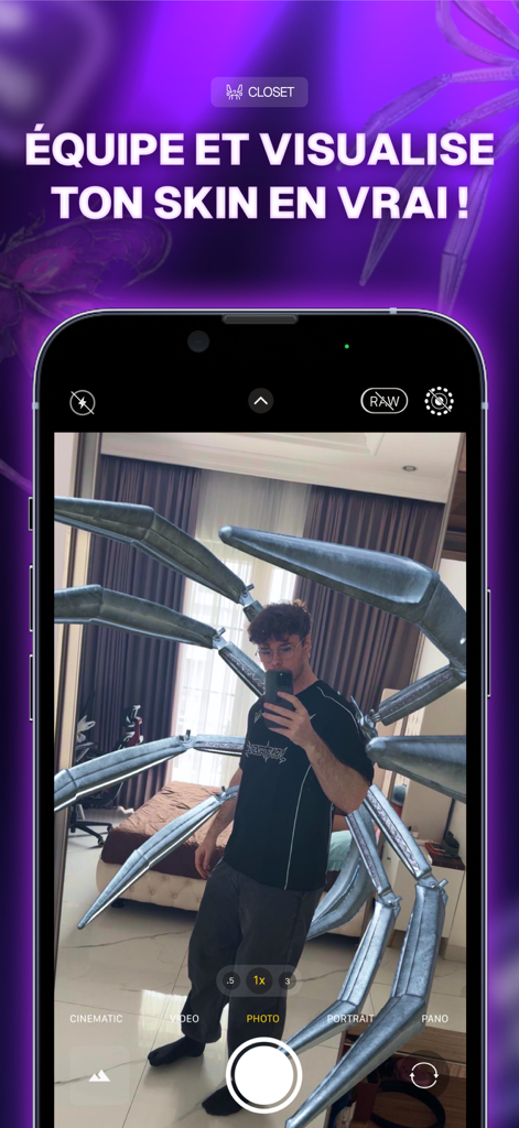 A user visualizing a digital phygital skin with large mechanical limbs using augmented reality in the Arntreal app