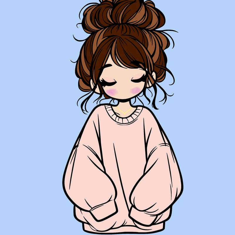 girl with baggy sweatshirt and messy bun