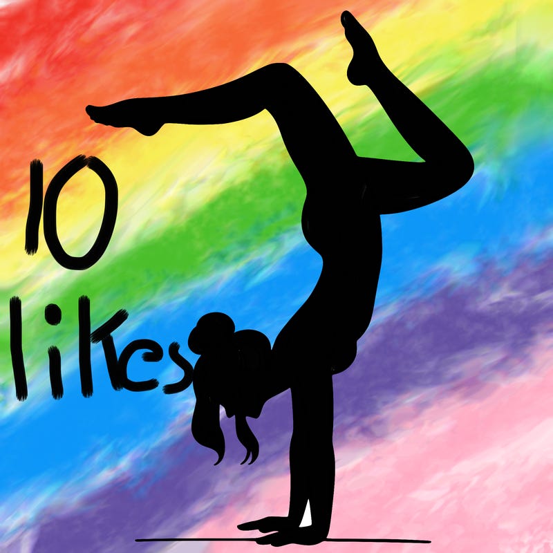 a woman doing a handstand