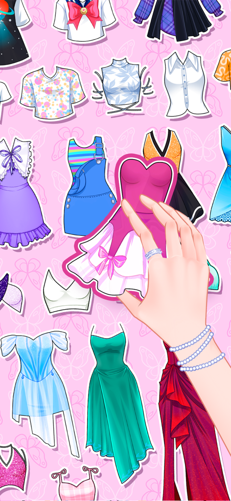A hand picking a pink paper dress from a collection of colorful doll clothes on a pink background