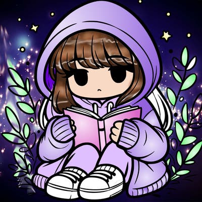 girl in oversized hoodie reading a book