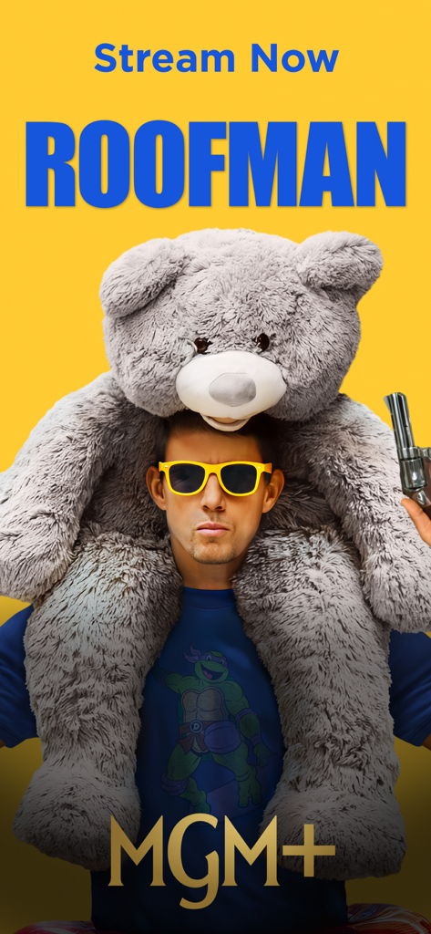 MGM plus app promotional banner for the movie Roofman featuring a man with a giant teddy bear and yellow sunglasses